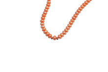 this . orange beads